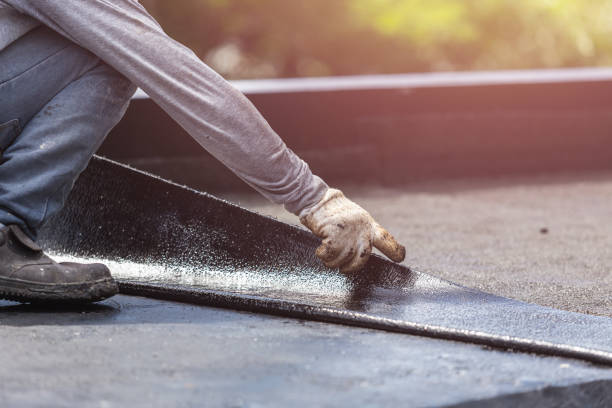 Professional Waterproofing technician working in Millburn, NJ